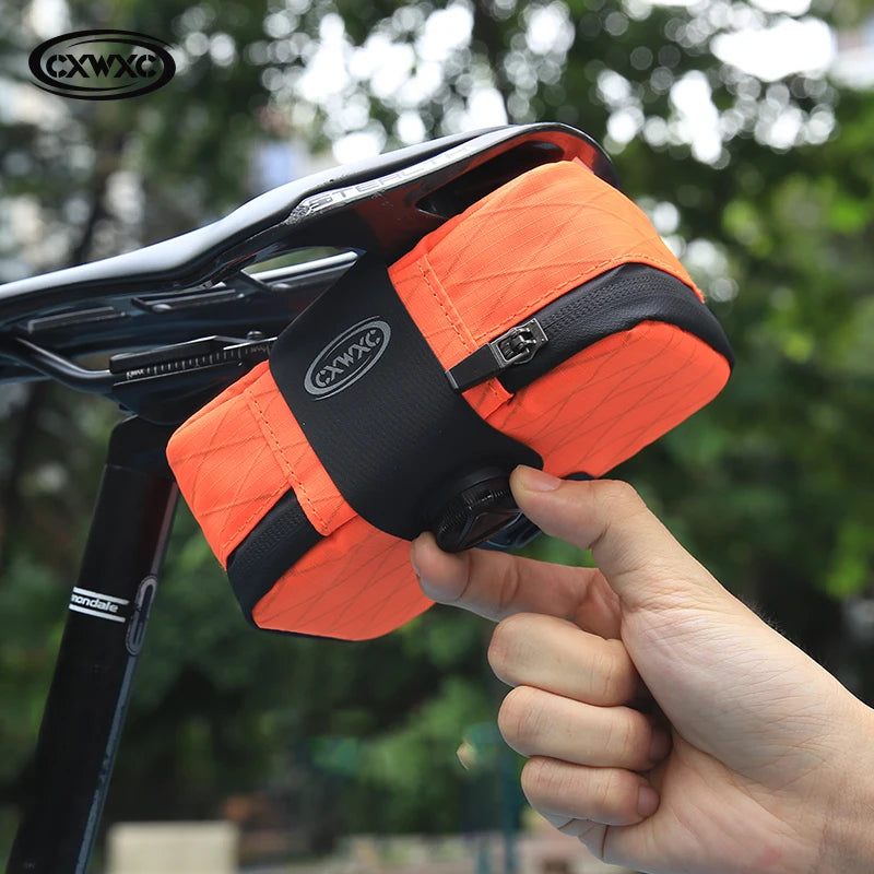 CXWXC Mini Bicycle Saddle Bag 0.6L Lightweight Small MTB Road Bike Tail Bag Portable Multi function boa Lockable Cycling Bag